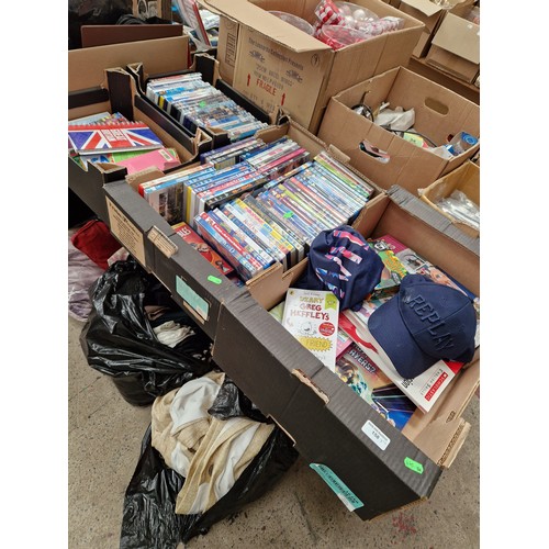 158 - Four boxes containing DVDs, books and hats