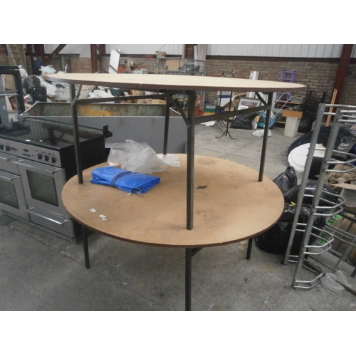 605 - A pair of circular function tables on folding stands