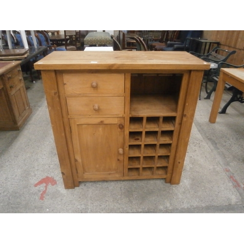 642 - A large pine 2 drawer kitchen unit with wine rack