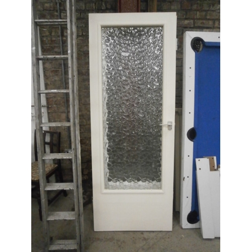 663 - A pair of glazed doors with fittings