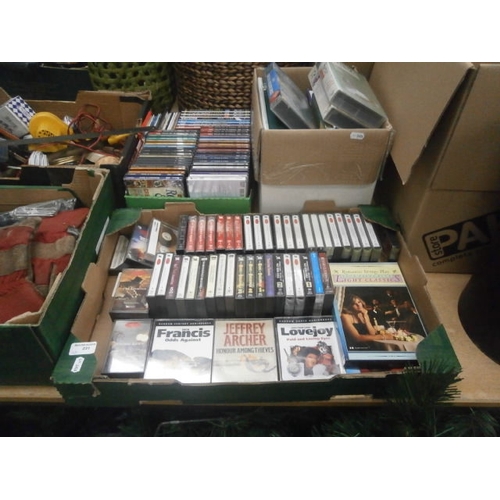 231 - Lot inc tapes, DVDs, videos and books