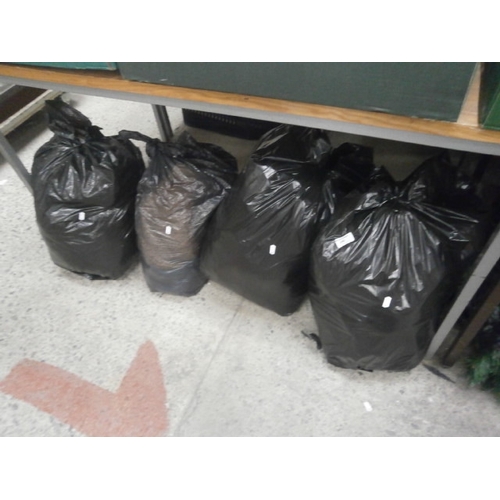 240 - Four bags of clothing