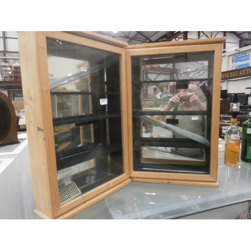 324 - Two wood and glass display units