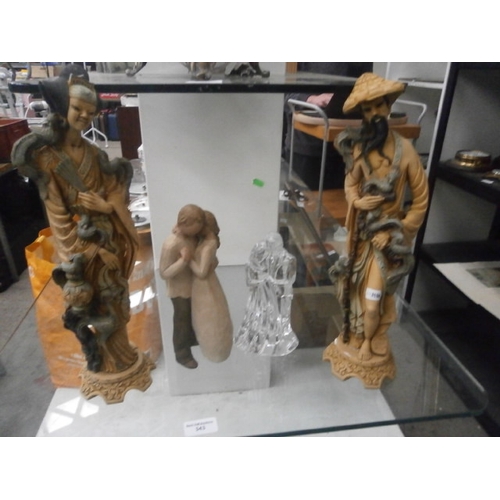 343 - Four ornamental figurines