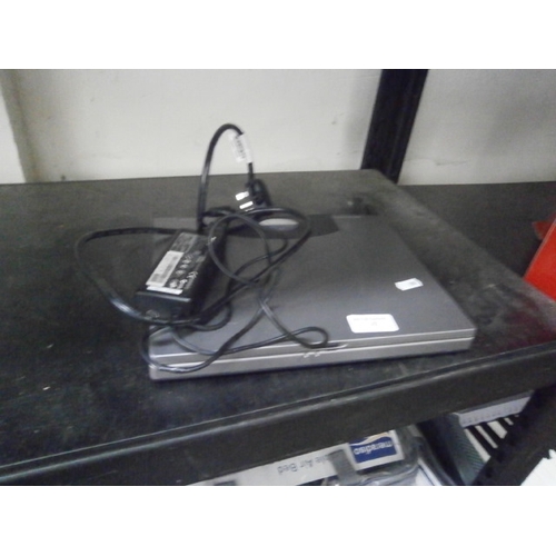 47 - Dell Latitude LS laptop with charger