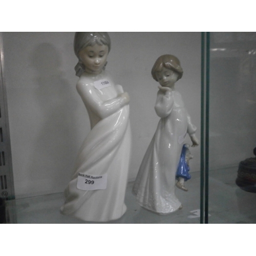 299 - Two Nao figurines