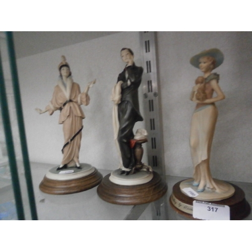 317 - Three assorted figurines