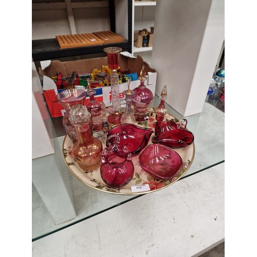 379 - Collection of cranberry glass pieces