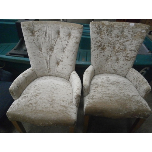 617 - A pair of button back upholstered chairs