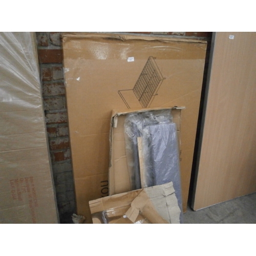 623 - A boxed 4 ft upholstered bed frame