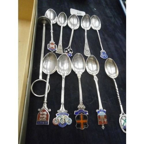 224 - Ten silver hallmarked souvenir spoons and silver hallmarked seal