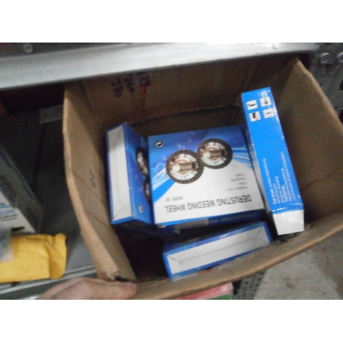 17 - Box of Derusting weeding wheels