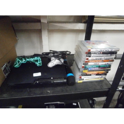 119 - PS3 with selection of games and two controllers and Singstar microphones. Working just needs an upda... 