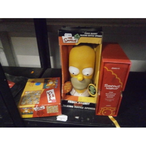 79 - Lot inc Talking Homer bottle opener, Simpson world episode guide seasons 1-20 and Simpsons jigsaw pu... 