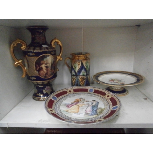 323 - Lot inc Royal Austria plate, decorative vase, Stoneware jug, cake stand