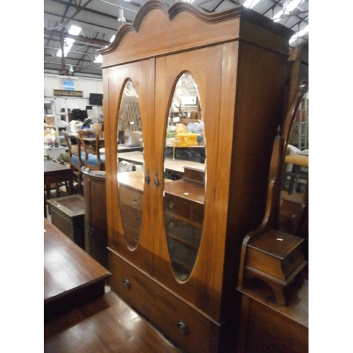 719 - A large Edwardian inlaid mahogany wardrobe with  2 x mirrored doors and lower drawer