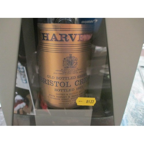 310 - Bottle of Harvey Bristol Cream in Harrods box. Bottled in 1983.