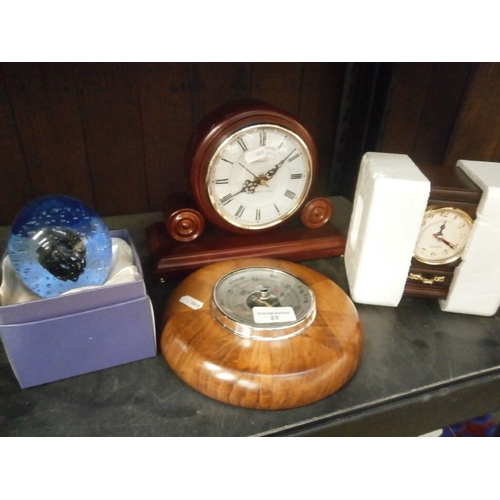 23 - Two clocks, barometer and paperweight