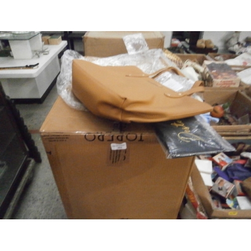 262 - Box of new Destello handbags