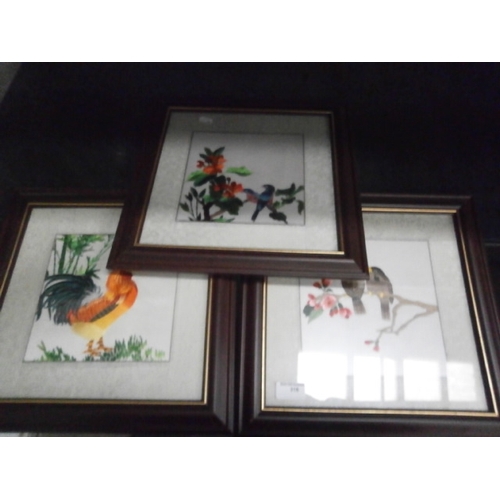 316 - Three decorative embroidered framed bird pictures