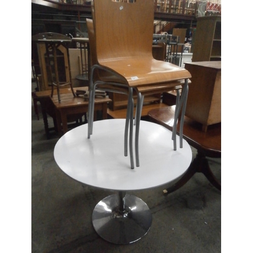 625 - A circular padestal breakfast table and 3 x stacking chairs