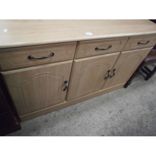 630 - A 3 drawer base unit sideboard