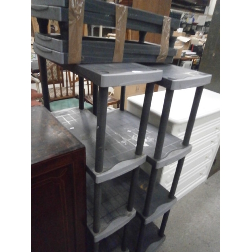 670 - 2 x stacking plastic shelf stands and 4 x shelves