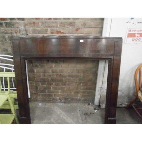 679 - A large vintage mahogany fire surround