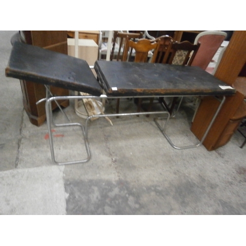 686 - A very early leather covered adjustable operating table on chromed metal frame. From Bronglais Hospi... 