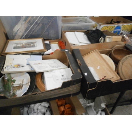 125 - Four boxes inc chopping boards, artwork, collectable plates, radio, etc