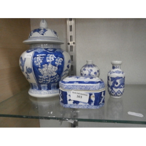 303 - Four oriental blue & white pottery pieces with markings to the base