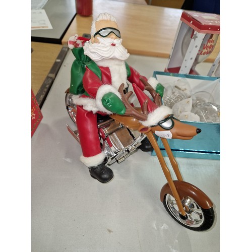 17 - Novelty musical Santa on motorcycle. Plays born to be wild