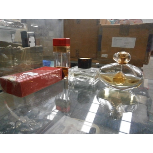 205 - Three assorted part full perfumes including estee lauder intuition, Dolce and gabbana and Hummer aft... 