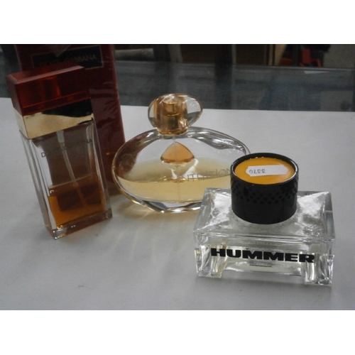 205 - Three assorted part full perfumes including estee lauder intuition, Dolce and gabbana and Hummer aft... 