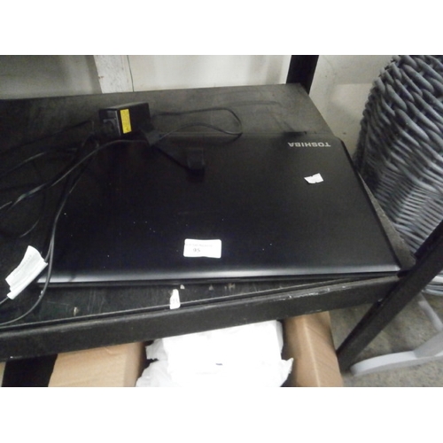 95 - Toshiba laptop with charger, working