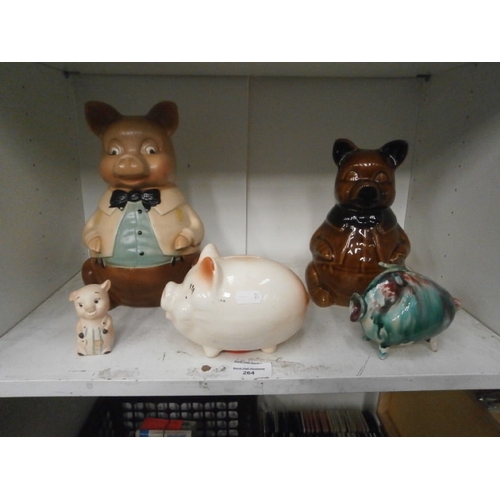 264 - Four piggy banks and piggy ornament