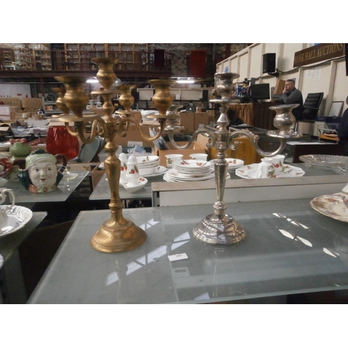 322 - Brass and chrome candelabras