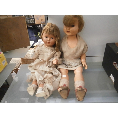 324 - Two vintage dolls