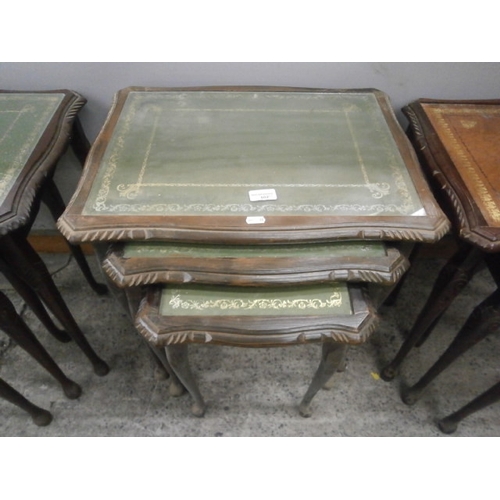 602 - A nest of 3 x vintage leather topped occasional tables