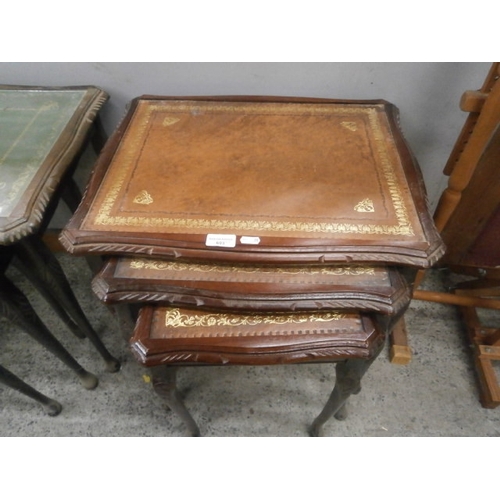 603 - A nest of 3 x vintage leather topped occasional tables