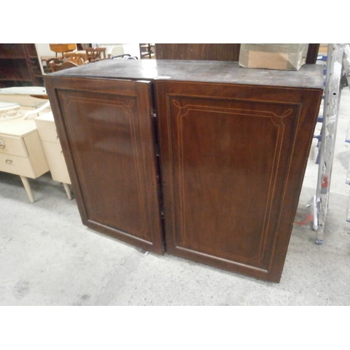 650 - A large antique 2 door inlaid mahogany cupboard with fitted sliding shelves