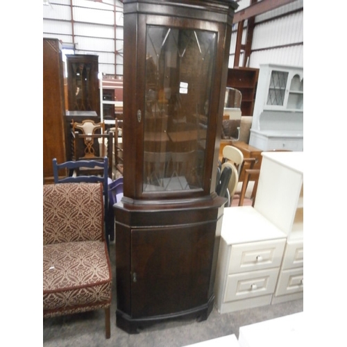 667 - A vintage glazed mahogany corner cabinet