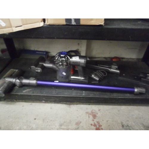 48 - Dyson cordless vacuum cleaner with attachments