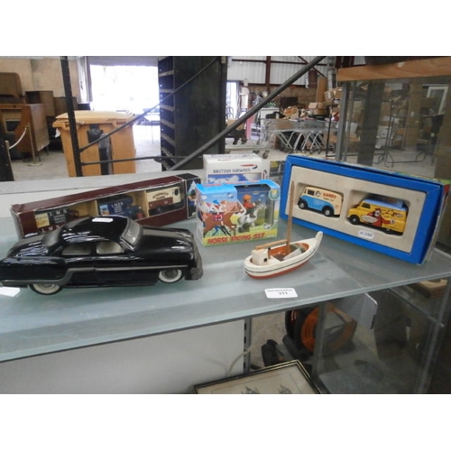 311 - Lot inc diecast cars, tin car, etc