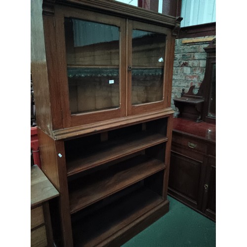 705 - Oak bookcase with upper glazed cabinet