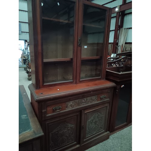 710 - Vintage bookcase unit with carved panel lower cupboard