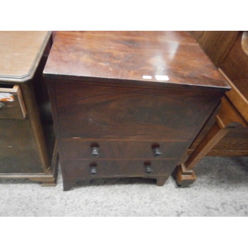 616 - An antique flame mahogany lift top faux chest commode