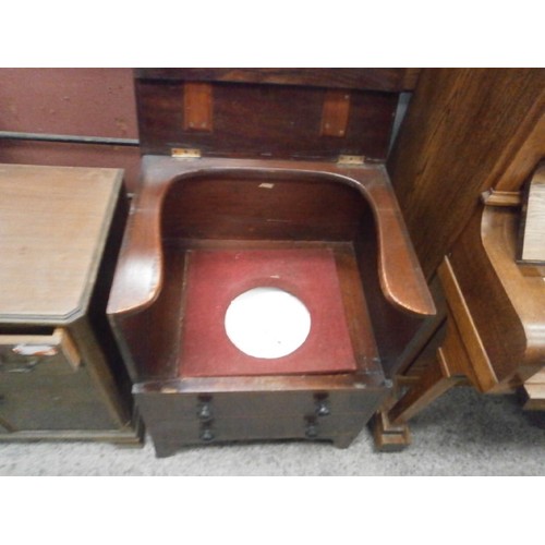 616 - An antique flame mahogany lift top faux chest commode