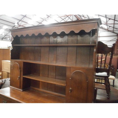 665 - A large vintage mahogany dresser on 7 drawer base