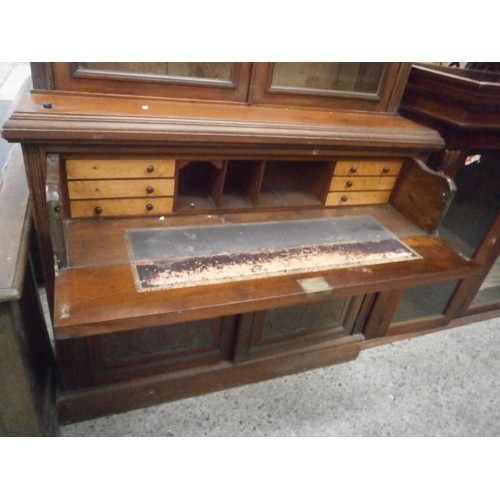 710 - Vintage bookcase unit with carved panel lower cupboard